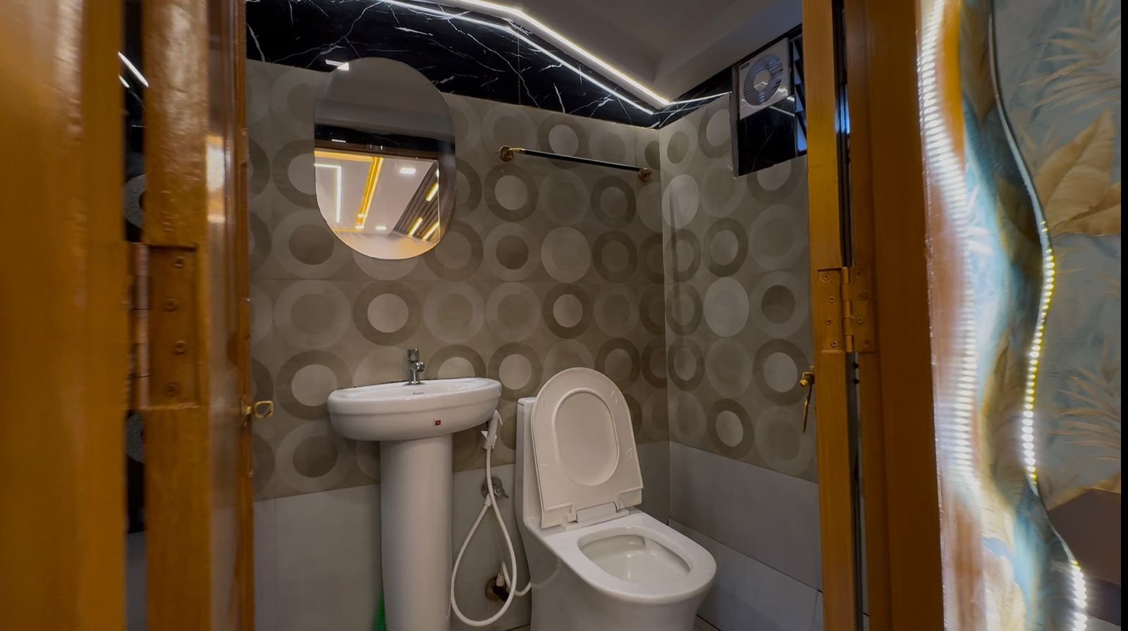 Open-air upper deck seating area on a 1 bedroom private houseboat in Kerala