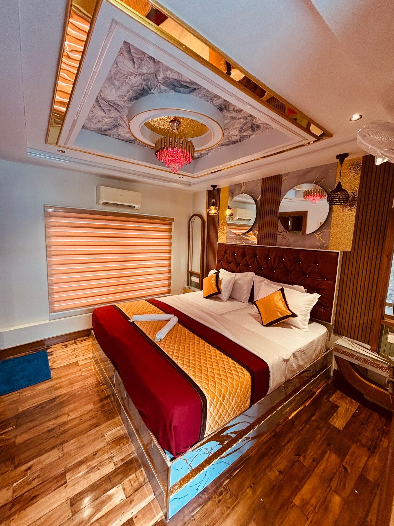 Luxury AC Bedroom Luxury air-conditioned master bedroom featuring a large double bed and modern decor inside our private Kerala backwater houseboat.