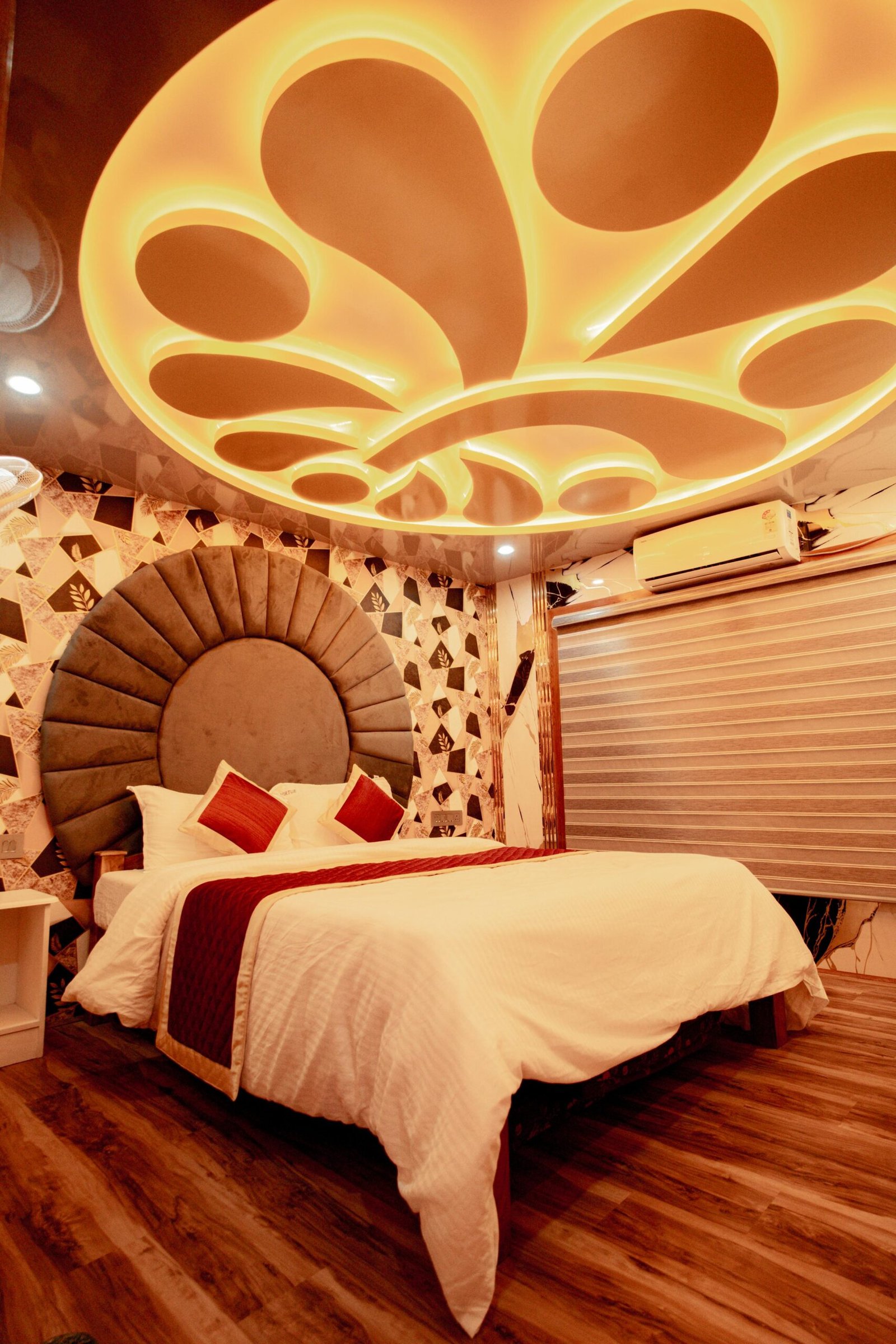 Luxury master suite featuring unique interior design on our 7 bedroom houseboat in Alleppey