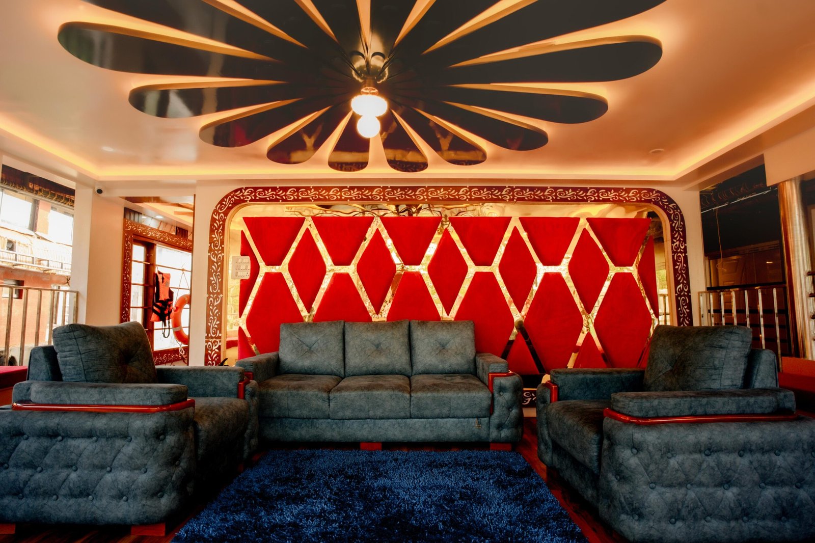 Spacious lounge and living area with comfortable seating on a 7 bedroom houseboat Alleppey