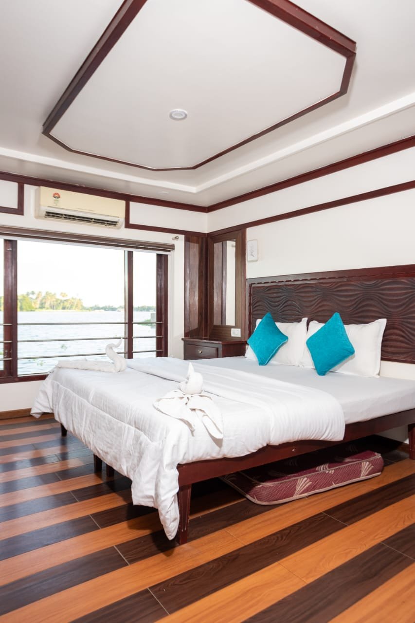 Well-Lit Sleeping Quarters Well-lit sleeping quarters ensuring a restful night during your Alleppey group vacation