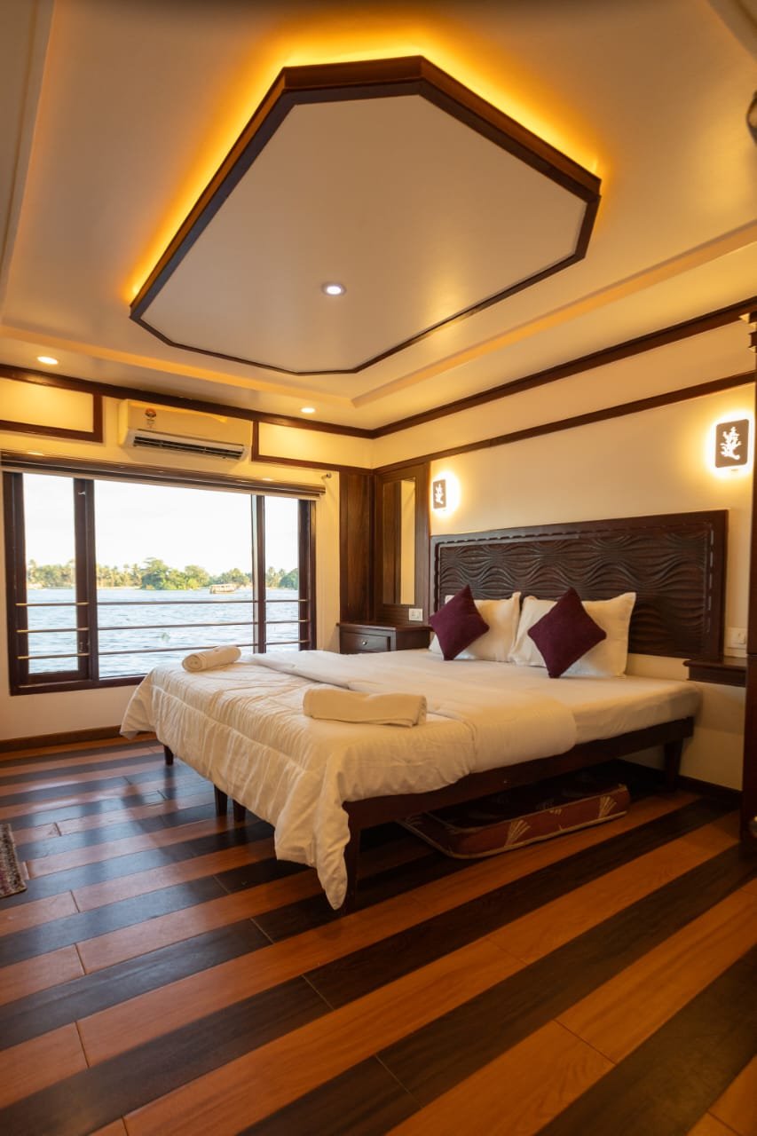 Premium Private Bedroom Setup Premium private bedroom featuring traditional wood finishes and scenic window views