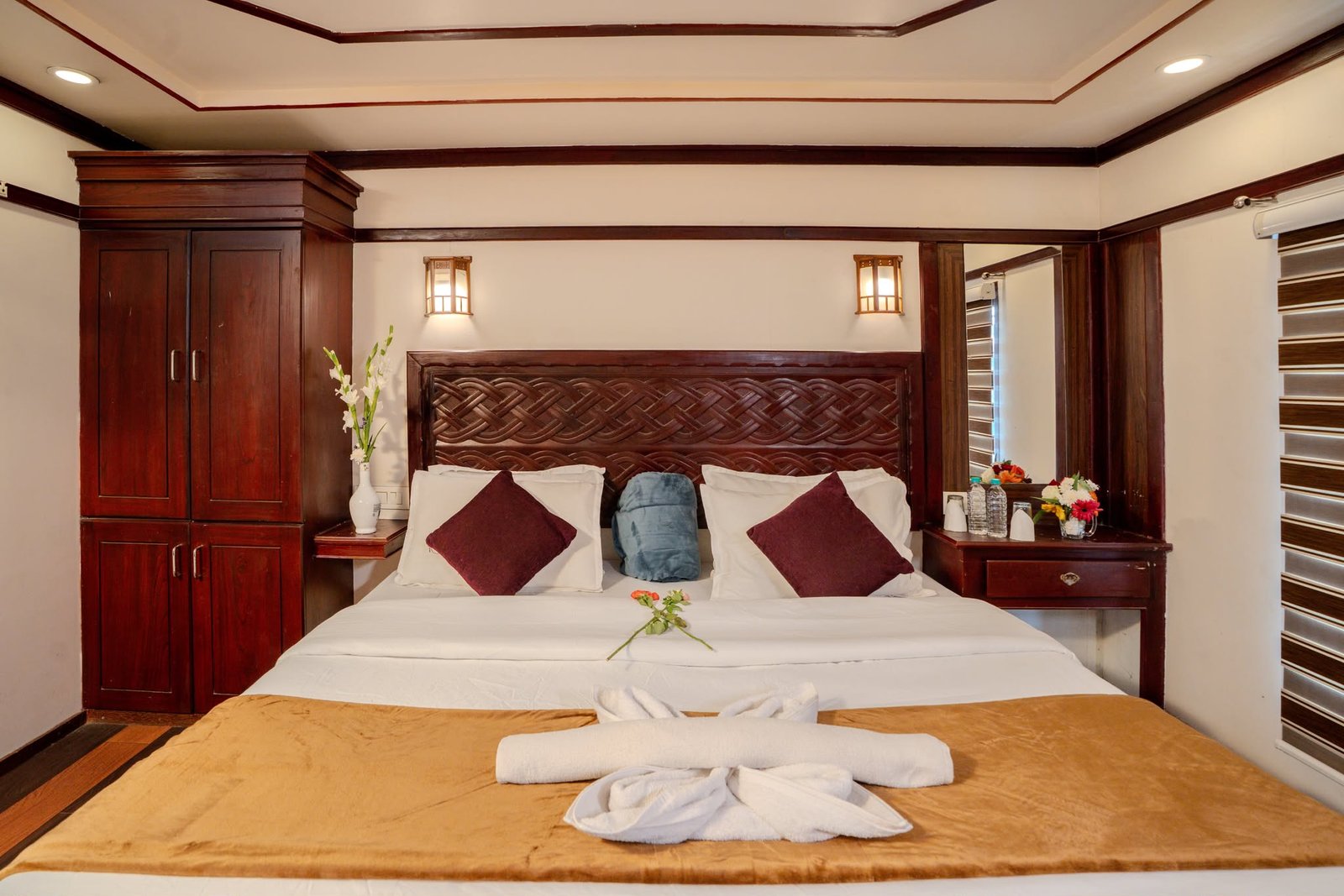 Luxury Suite with Wardrobe Luxury suite equipped with a wooden wardrobe and comfortable bedding for guests
