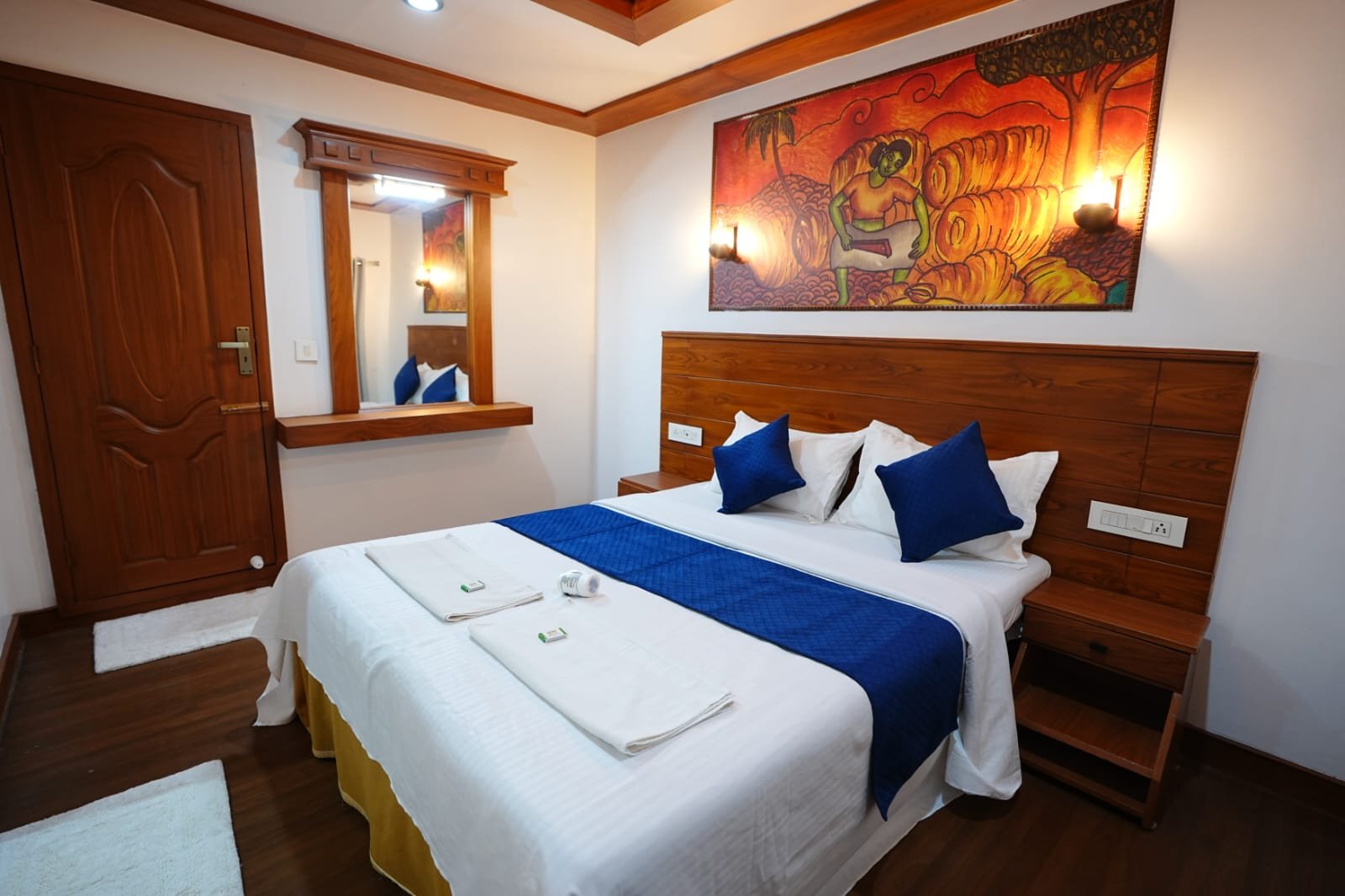 Third luxury AC bedroom featuring elegant decor and a comfortable double bed for extended families.