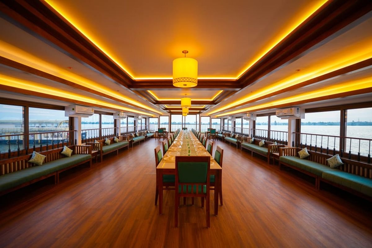 12 Bedroom Houseboat Alleppey Dining Area Spacious wooden dining hall inside the 12 bedroom houseboat Alleppey