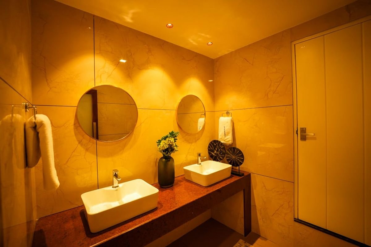 Modern Double Sink Bathroom in 12 Bedroom Houseboat Alleppey Modern bathroom featuring double sinks inside the 12 bedroom houseboat Alleppey