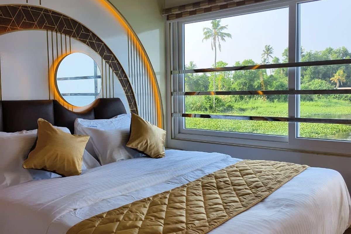 Scenic Bedroom - 14 Bedroom Houseboat Alleppey Scenic backwater window view from a suite inside the 14 bedroom houseboat Alleppey